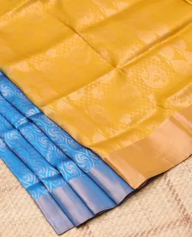Blue semi-soft silk saree with unique designs, plain border & contrast intricate pallu of paisley & floral designs
