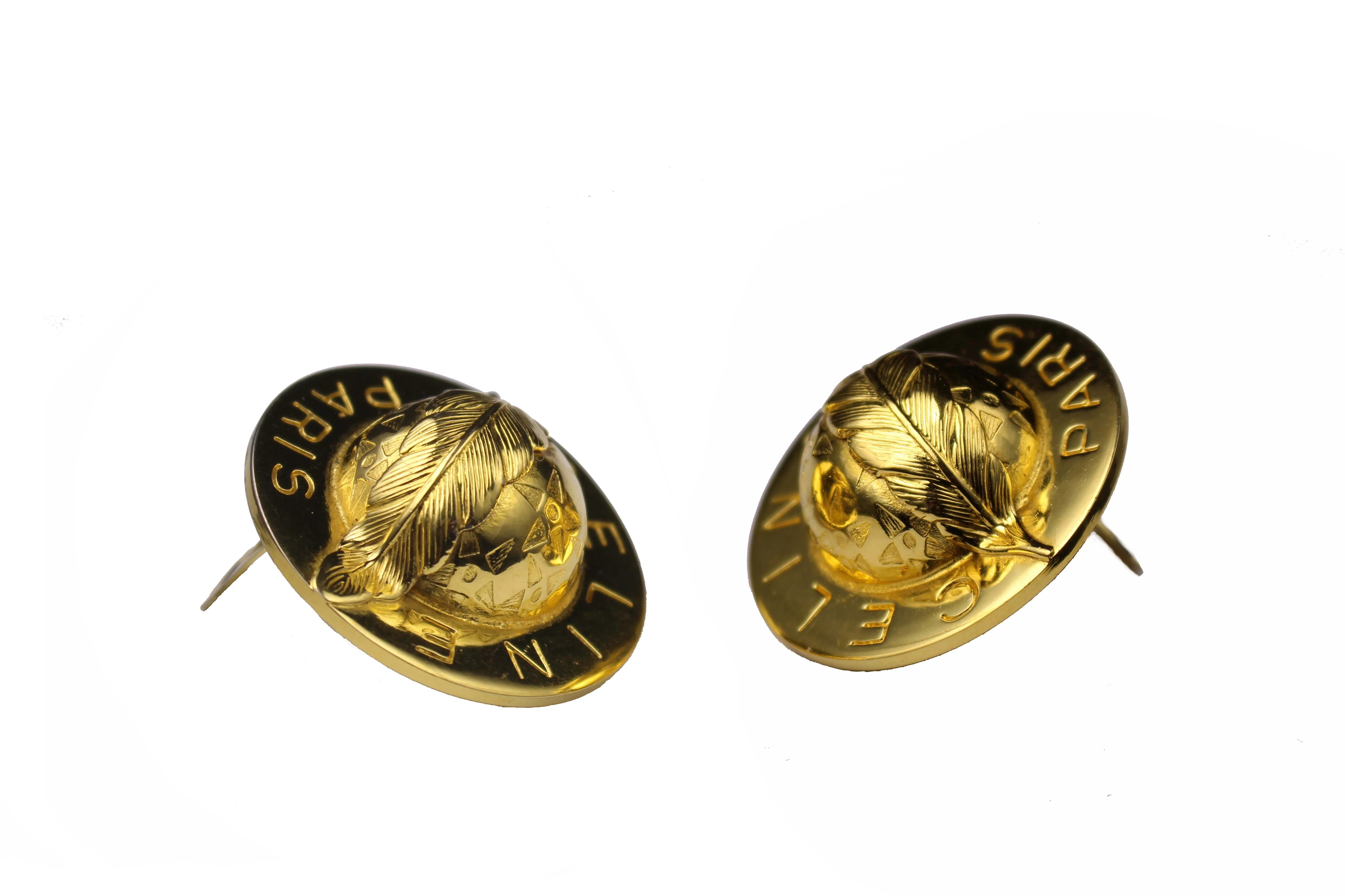 CELINE PARIS chunky logo globe stars feather earrings