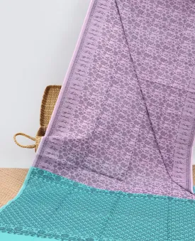 Lavender unique design semi-silk cotton saree, warli motif border & pallu features intricate designs