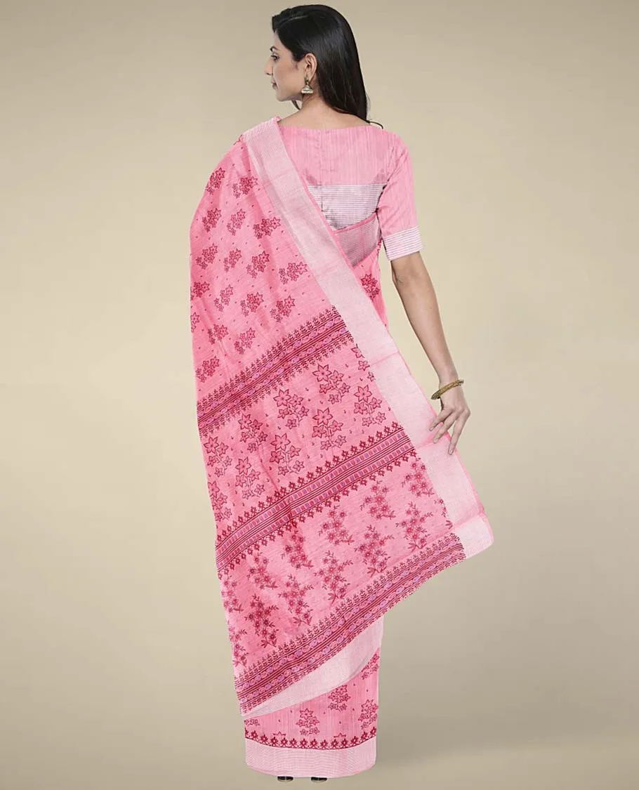 Pink budget cotton saree with unique buttas, self-border & pallu of floral designs