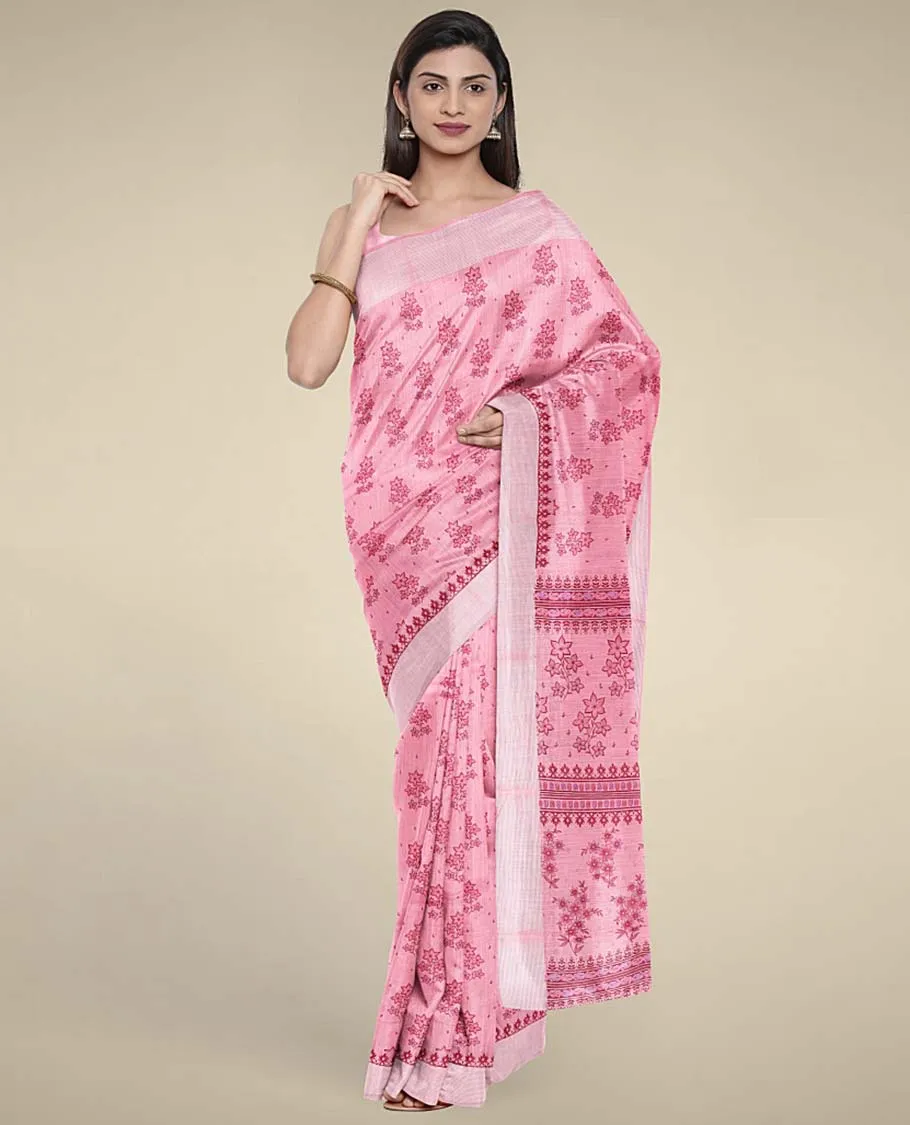 Pink budget cotton saree with unique buttas, self-border & pallu of floral designs