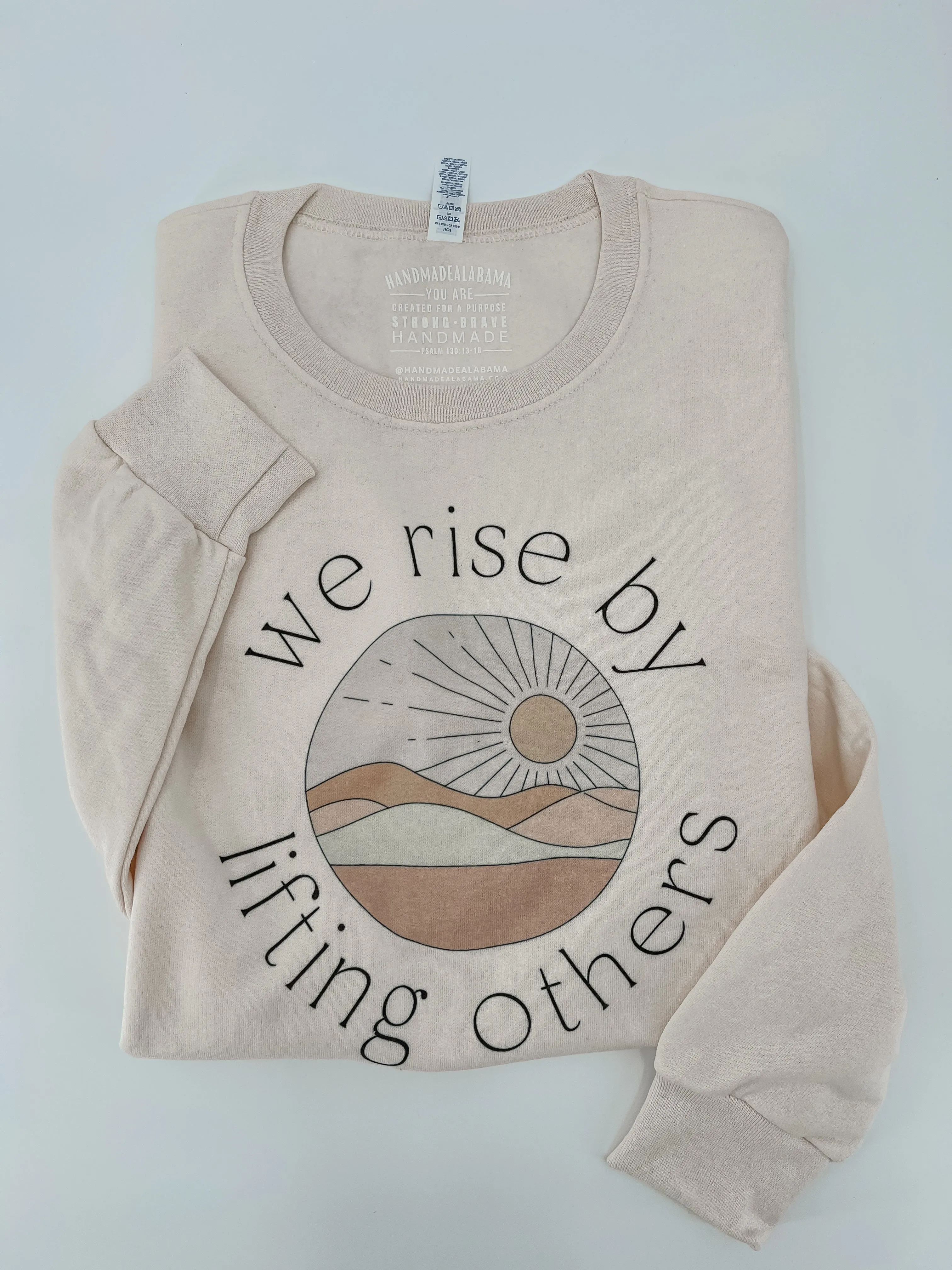 We Rise By Lifting Others Graphic Sweatshirt